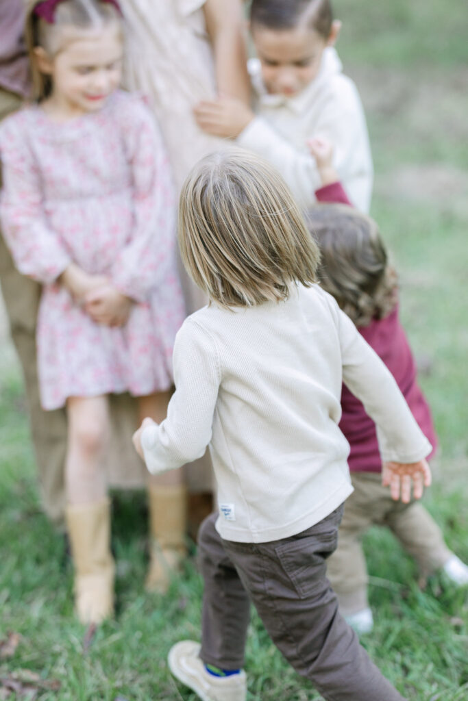 Documentary-style moment of kids running by the camera